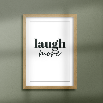 Poster Laugh more inramad mot grön vägg